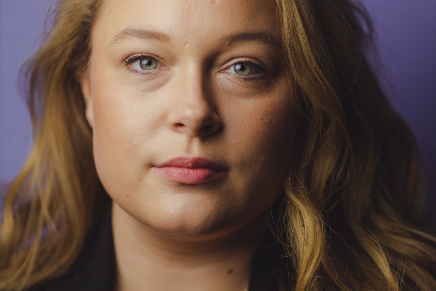 A photo of Annabel from the shoulders up, her hair is loose around her shoulders